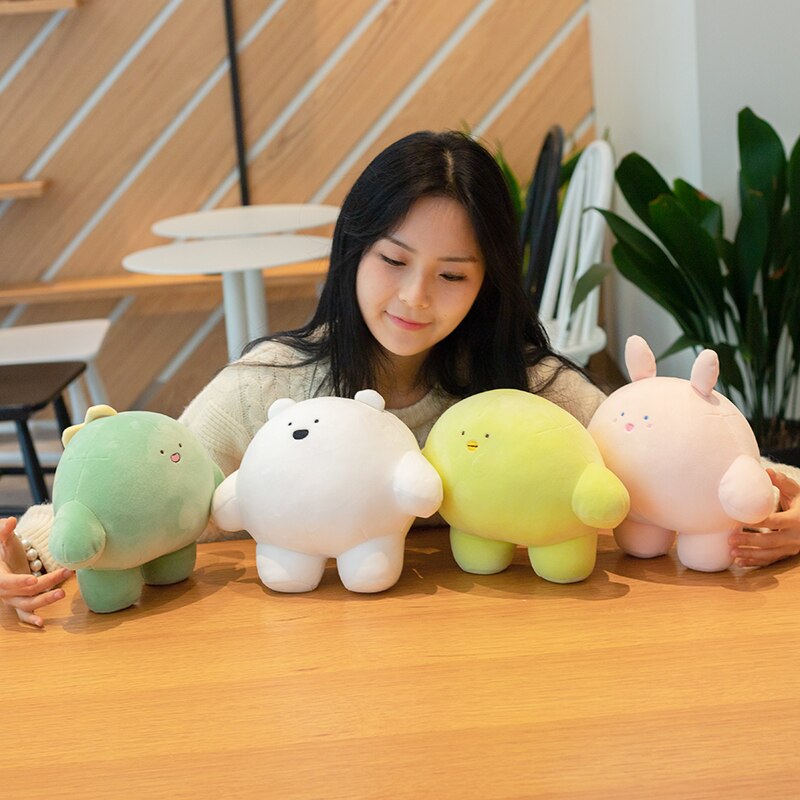 Girl with four round plushies