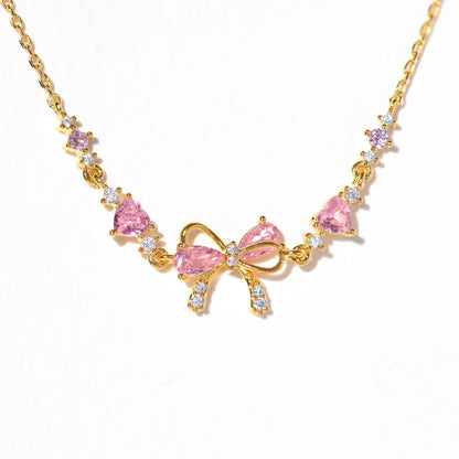 Hearty Pink & Gold Bow Bracelet
