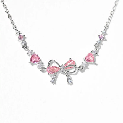 Hearty Pink & Gold Bow Bracelet