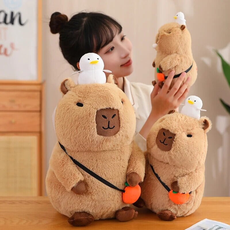 kawaiies-softtoys-plushies-kawaii-plush-Fluffy Sleepy Capybara with Orange Plushie Soft toy 