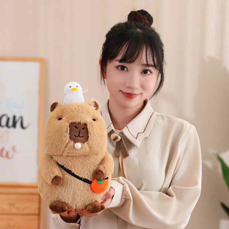 kawaiies-softtoys-plushies-kawaii-plush-Fluffy Sleepy Capybara with Orange Plushie Soft toy 
