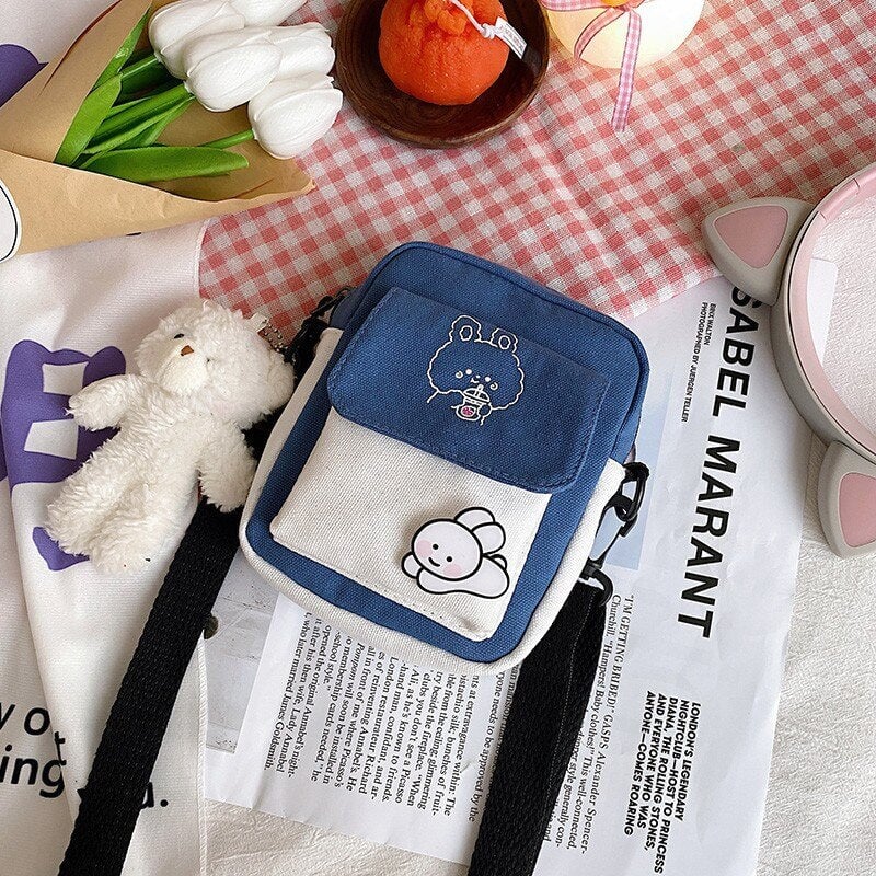 https://www.kawaiies.com/cdn/shop/products/kawaiies-plushies-plush-softtoy-funny-bunny-canvas-side-bag-new-apparel-blue-with-keychain-204046.jpg?v=1669654680