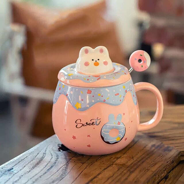 https://www.kawaiies.com/cdn/shop/products/kawaiies-plushies-plush-softtoy-kawaii-donut-bunny-ceramic-mug-with-lid-spoon-new-home-decor-pink-178446.jpg?v=1680038619